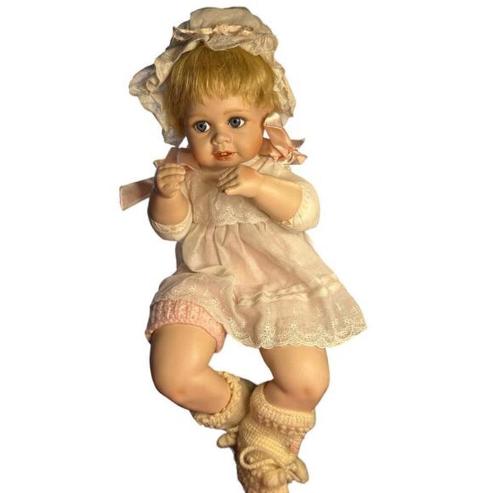 Doll  This beautiful porcelain doll from The Hamilton Collection is a must-have
